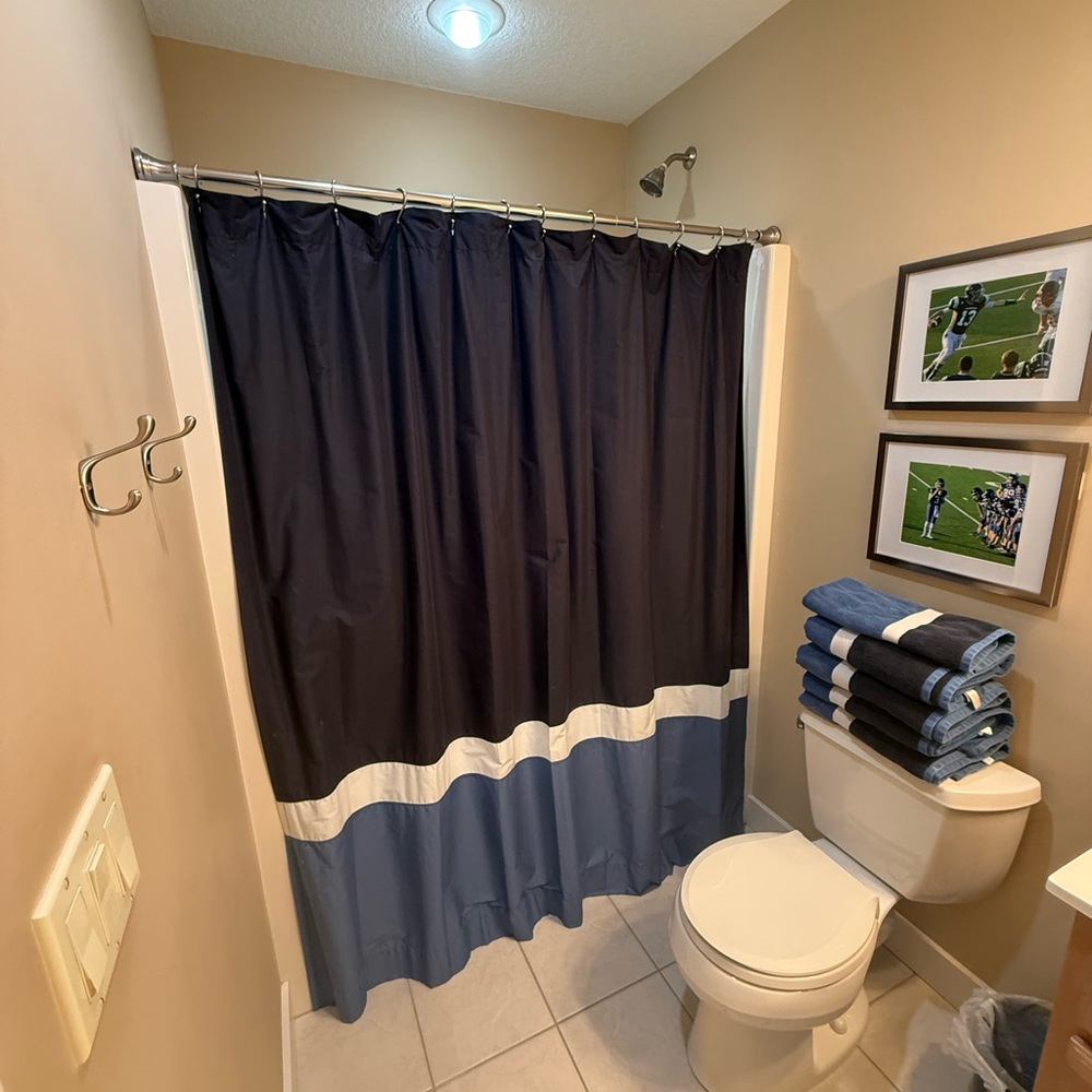 Pottery Barn Teen Dark Blue and Light Blue Shower Curtain, rug & towels.